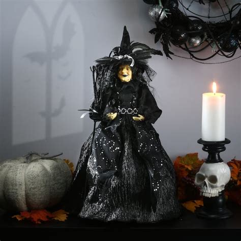 Get ready for a spellbinding Halloween with a standing witch that lights up and makes sounds